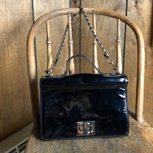 Black patent leather shoulder bag by innue
